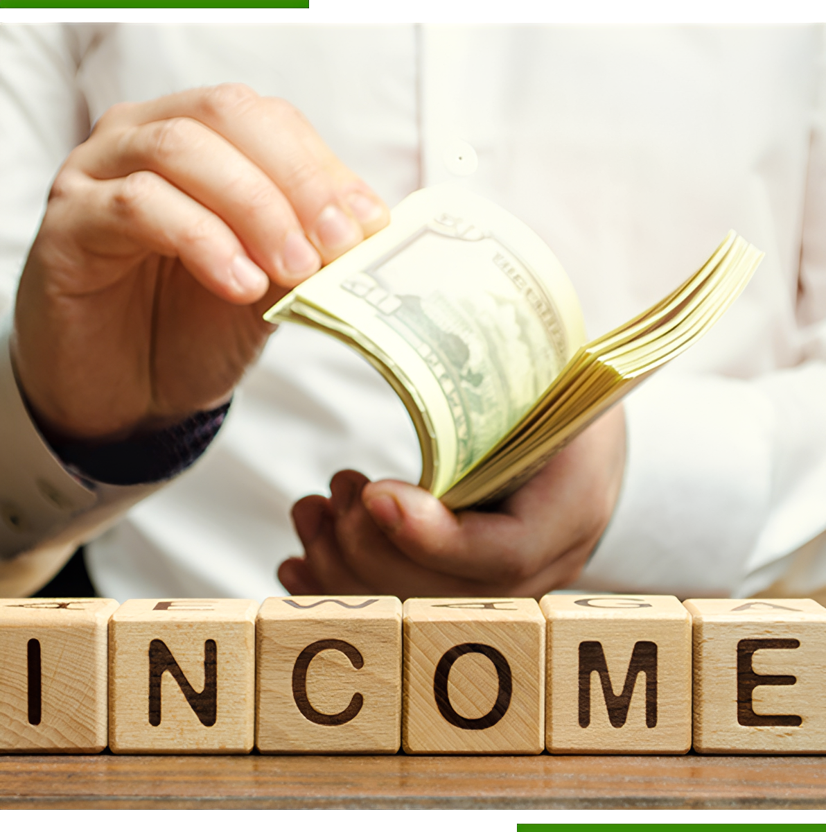 Person handling cash and income blocks