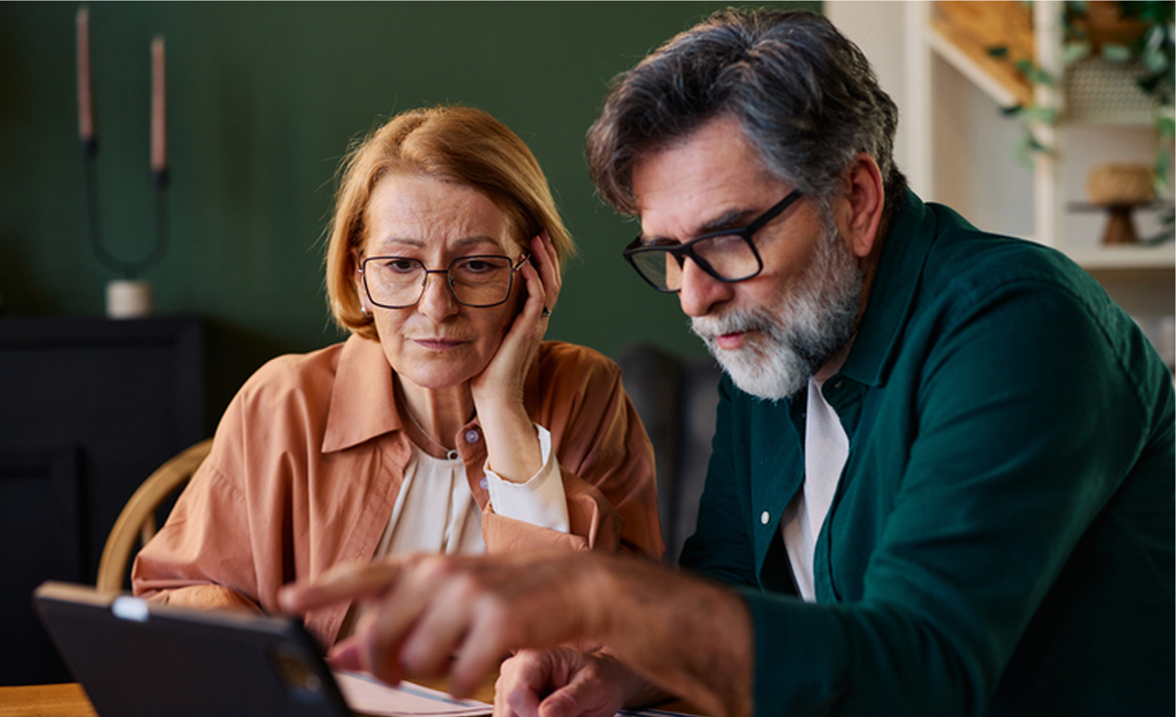 Older couple using a tablet together